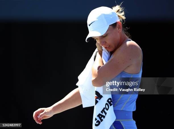 Simona Halep of Romania leaves the court for a break at the end of the first set in her match against Jessica Pegula of the United States during the...