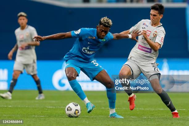 Mateo Cassierra of Zenit St. Petersburg and Nikita Ermakov of CSKA Moscow vie for the ball during the Russian Premier League match between FC Zenit...