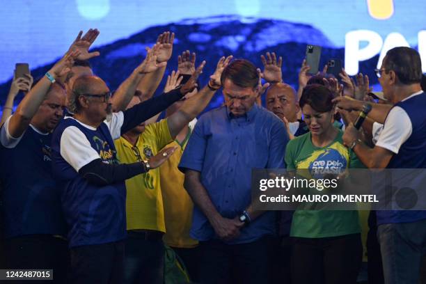 Evangelical Minister Silas Malafaia and other evangelical leaders pray around Brazilian President Jair Bolsonaro and First Lady Michelle Bolsonaro...