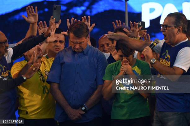 Evangelical Minister Silas Malafaia and other evangelical leaders pray around Brazilian President Jair Bolsonaro and First Lady Michelle Bolsonaro...