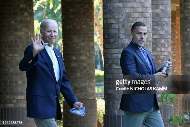 President Joe Biden waves alongside his son Hunter Biden after attending mass at Holy Spirit Catholic Church in Johns Island, South Carolina on...
