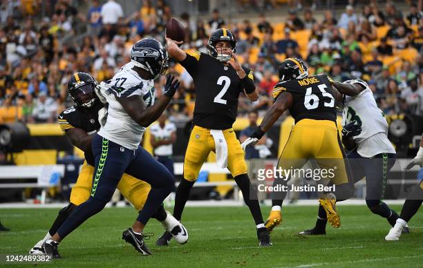 Mason Rudolph of the Pittsburgh Steelers throws a 26-yard touchdown pass to George Pickens in the first quarter during a preseason game against the...
