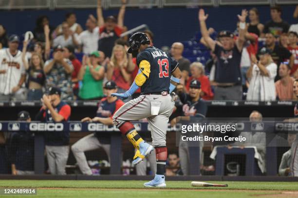 Ronald Acuña Jr. #13 of the Atlanta Braves celebrates after hitting a home run during the first inning against the Miami Marlins at loanDepot park on...