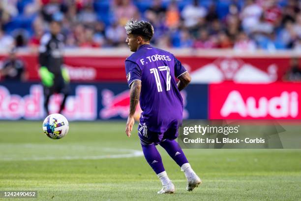 Facundo Torres of Orlando City SC looks to keep the ball in the first half of the Major League Soccer match against New York Red Bulls at Red Bull...