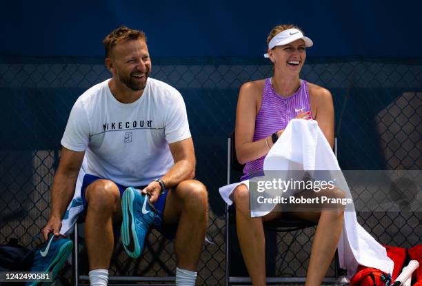 Petra Kvitova of the Czech Republic and boyfriend Jiri Vanek react during practice on Day 1 of the Western & Southern Open at Lindner Family Tennis...