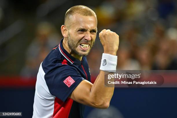Daniel Evans of Great Britain celebrates a point in the second set of a tiebreaker against Pablo Carreno Busta of Spain in the semifinals during Day...
