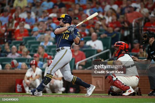 Hunter Renfroe of the Milwaukee Brewers hits an RBI triple during the tenth inning against the St. Louis Cardinals at Busch Stadium on August 13,...