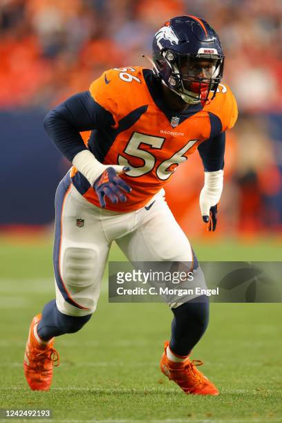 Baron Browning of the Denver Broncos rushes against the Dallas Cowboys during the second quarter at Empower Field At Mile High on August 13, 2022 in...