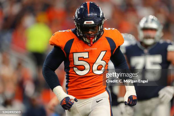 Baron Browning of the Denver Broncos reacts after a pass break up against the Dallas Cowboys during the second quarter at Empower Field At Mile High...