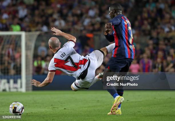 Isi Palazon and Ousmane Dembele during the match between FC Barcelona and Rayo Vallecano, corresponding to the week 1 ofv the Liga Santander, played...