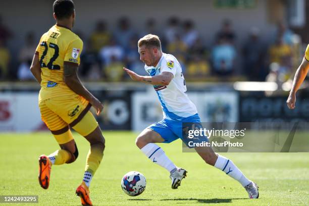 Ben Whitfield of Barrow AFC runs with the ball during the Sky Bet League 2 match between Sutton United and Barrow at the Knights Community Stadium,...