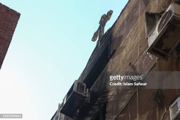 Damage is seen after a fire tore through a Coptic Christian church on August 14, 2022 in the Imbaba neighborhood of Giza, Egypt. More than 40 people...