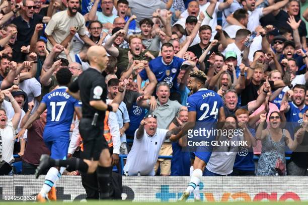 Chelsea's English defender Reece James celebrates after scoring their second goal during the English Premier League football match between Chelsea...