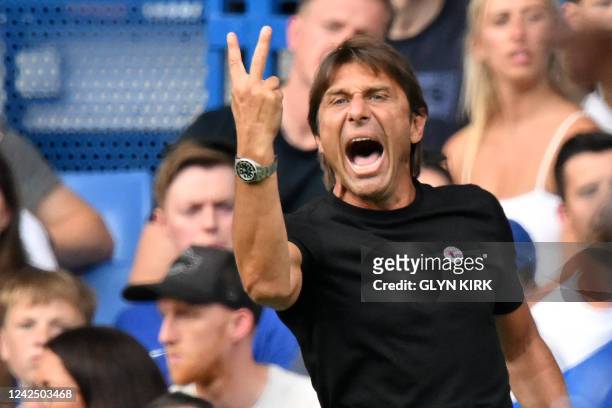 Tottenham Hotspur's Italian head coach Antonio Conte gestures on the touchline during the English Premier League football match between Chelsea and...