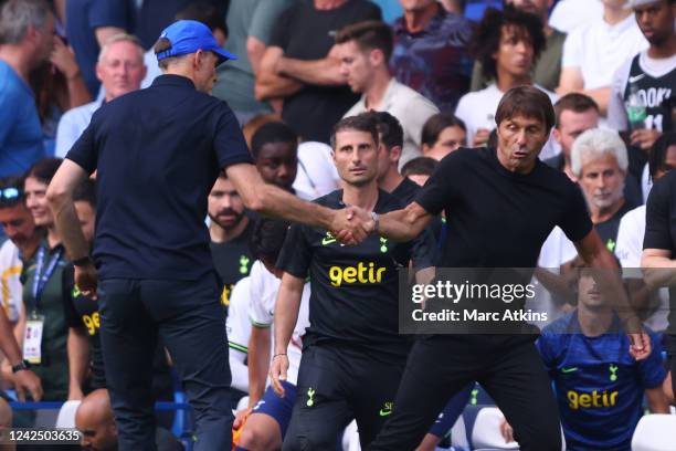 Chelsea Head Coach Thomas Tuchel and Tottenham Hotspur Head Coach Antonio Conte clash after the Premier League match between Chelsea FC and Tottenham...