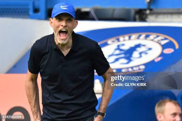 Chelsea's German head coach Thomas Tuchel gestures on the touchline during the English Premier League football match between Chelsea and Tottenham...