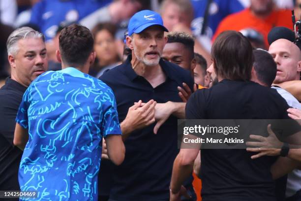 Chelsea Head Coach Thomas Tuchel and Tottenham Hotspur Head Coach Antonio Conte clash after the Premier League match between Chelsea FC and Tottenham...