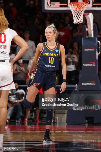 Lexie Hull of the Indiana Fever stretches during the game against the Washington Mystics on August 14, 2022 at Entertainment & Sports Arena in...