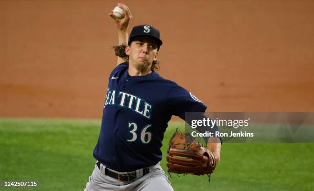 Logan Gilbert of the Seattle Mariners pitches against the Texas Rangers during the first inning at Globe Life Field on August 14, 2022 in Arlington,...