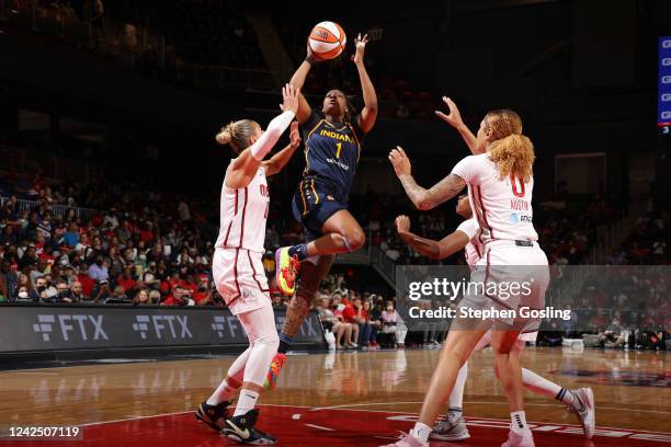 NaLyssa Smith of the Indiana Fever shoots the ball during the game against the Washington Mystics on August 14, 2022 at Entertainment & Sports Arena...