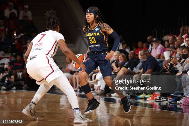 Destanni Henderson of the Indiana Fever handles the ball during the game against the Washington Mystics on August 14, 2022 at Entertainment & Sports...