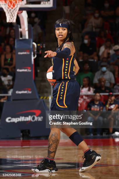 Destanni Henderson of the Indiana Fever points during the game against the Washington Mystics on August 14, 2022 at Entertainment & Sports Arena in...