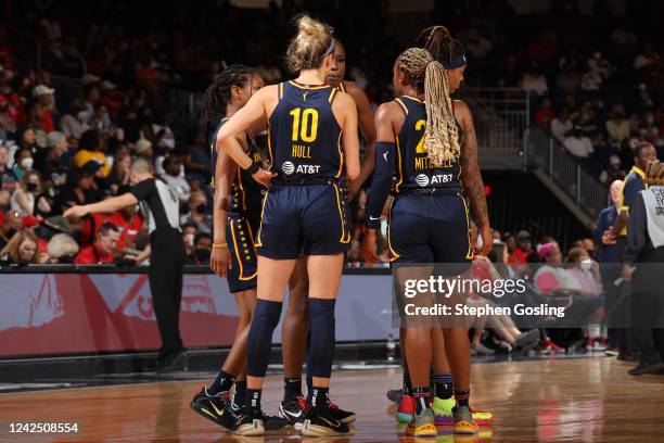 Indiana Fever huddle during the game against the Washington Mystics on August 14, 2022 at Entertainment & Sports Arena in Washington, DC. NOTE TO...