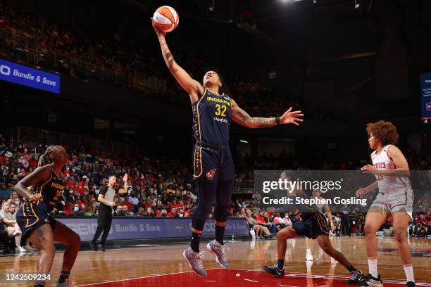 Emma Cannon of the Indiana Fever rebounds the ball during the game against the Washington Mystics on August 14, 2022 at Entertainment & Sports Arena...