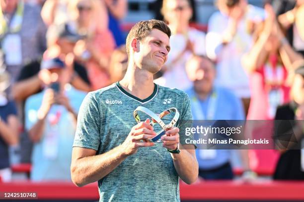 Hubert Hurkacz of Poland holds his trophy after finishing second in the final round against Pablo Carreno Busta of Spain during Day 9 of the National...