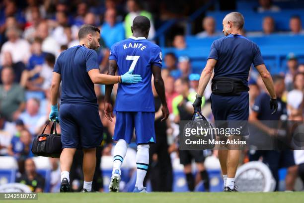 Golo Kante of Chelsea leaves the game injured during the Premier League match between Chelsea FC and Tottenham Hotspur at Stamford Bridge on August...