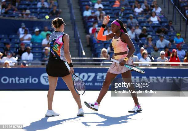 Coco Gauff of the United States and Jessica Pegula of the United States play against Nicole Melichar-Martinez of the United States and Ellen Perez of...