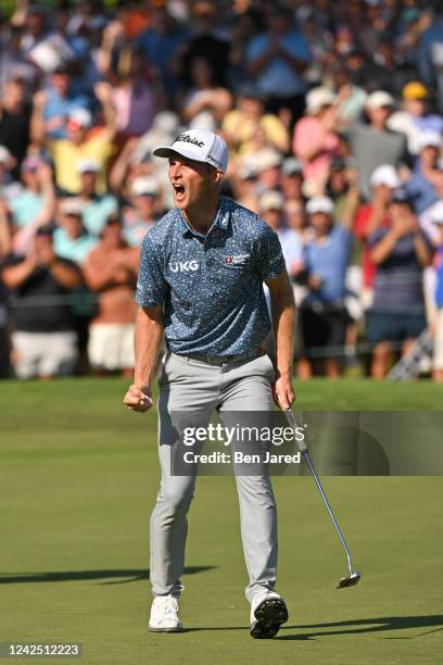 Will Zalatoris celebrates after making a putt on the 18th green during the final round of the FedEx St. Jude Championship at TPC Southwind on August...