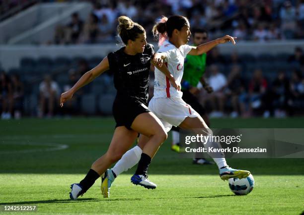 Cari Roccaro of Angel City FC puts the pressure on Yuki Nagasato of the Chicago Red Stars during the first half of National Women's Soccer League...
