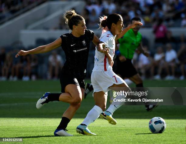 Cari Roccaro of Angel City FC puts the pressure on Yuki Nagasato of the Chicago Red Stars during the first half of National Women's Soccer League...