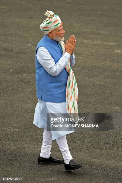India's Prime Minister Narendra Modi arrives to address the nation from the ramparts of the Red Fort during the celebrations to mark countrys...
