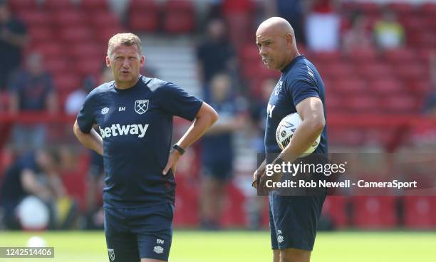 West Ham United coaches Billy McKinlay and Paul Nevin during the Premier League match between Nottingham Forest and West Ham United at City Ground on...