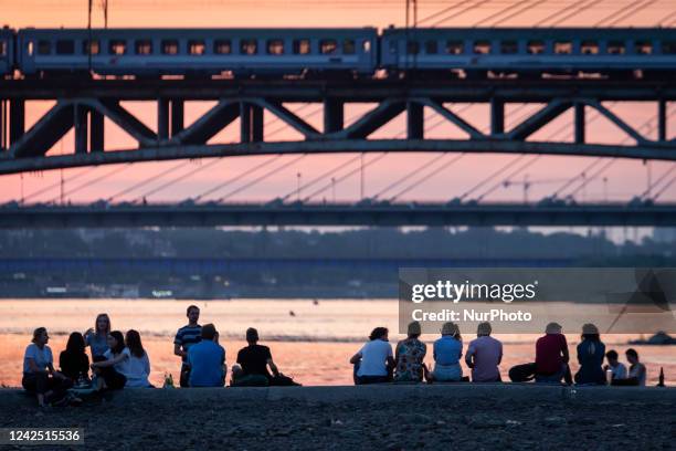 Varsovians spend their Friday evening by the Vistula River in Warsaw, Poland on June 14, 2019