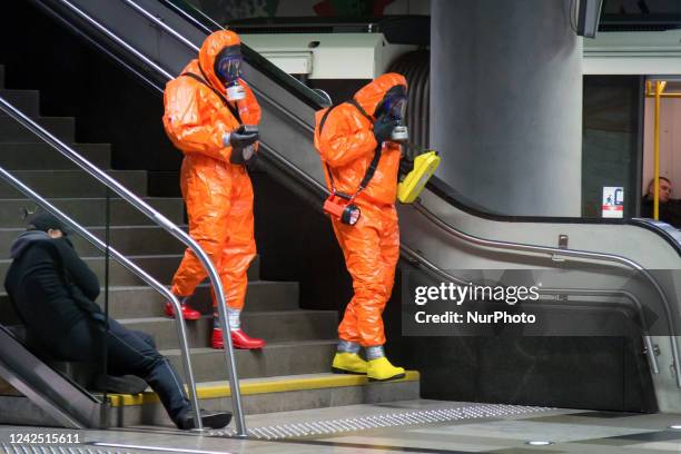 Members of Polish rescue services wearing protective suits and gas masks, operate during a Counter-terrorism exercises Patrol-15 simulating a...