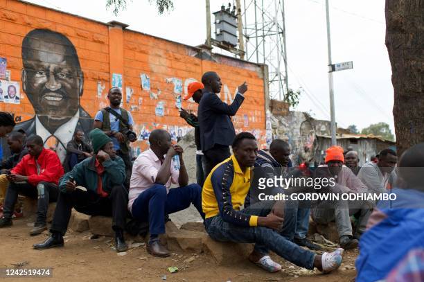 Supporters of Kenya's Azimio La Umoja Party presidential candidate Raila Odinga gather as they wait for Kenya's general election results in Kibera,...