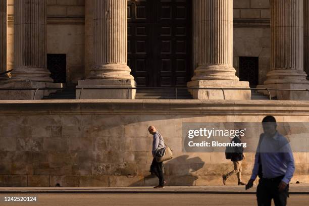 Commuters walk in view of St. Paul's Cathedral in London, UK, on Monday, Aug. 15, 2022. The Office for National Statistics are due to the release the...