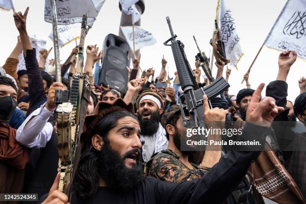 Taliban take to the streets during a national holiday celebrating the first anniversary of the Taliban takeover on August 15, 2022 in Kabul,...