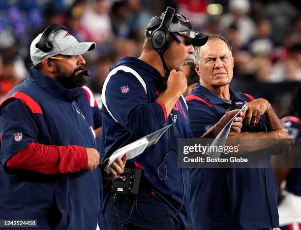 Foxborough, MA Matt Patricia, senior football advisor/offensive line coach, Joe Judge, offensive assistant/quarterbacks coach and Bill Belichick,...