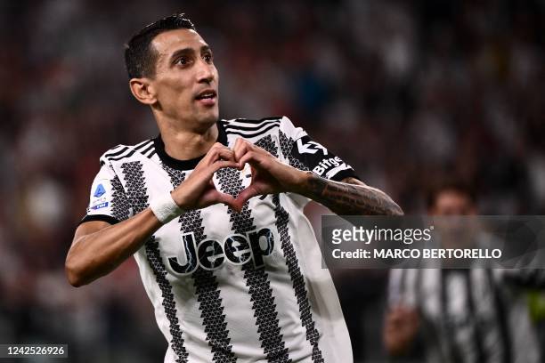 Juventus' Argentinian forward Angel Di Maria celebrates after opening the scoring during the Italian Serie A football match between Juventus and...