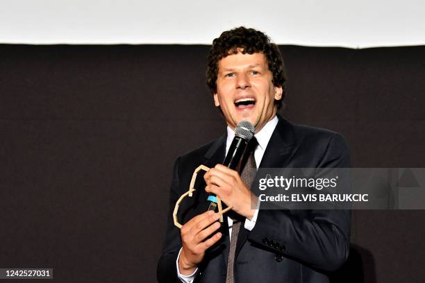 Actor and film director Jesse Eisenberg reacts after receiving his honorary "Heart of Sarajevo" award during the screening of his new film "After You...