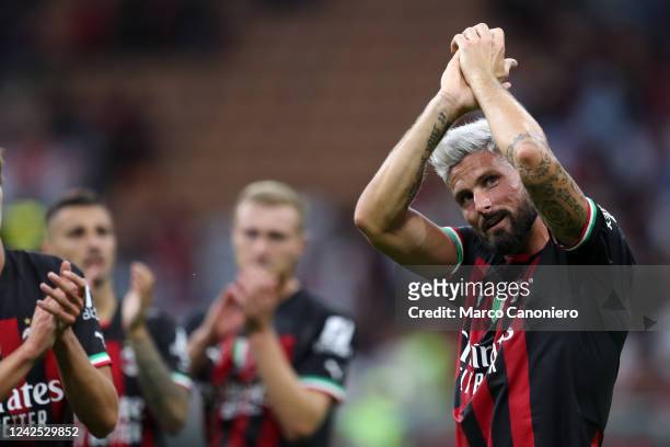 Olivier Giroud of Ac Milan greets the fans at the end of the Serie A match between Ac Milan and Udinese Calcio. Ac Milan wins 4-2 over Udinese Calcio.