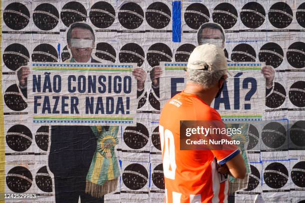 People stage a demonstration against Brazilian President Jair Bolsonaro and in defense of democracy and elections at Avenida Paulista in Sao Paulo,...