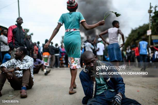 Supporters of Kenya's Azimio La Umoja Party presidential candidate Raila Odinga react during a protest against the results of Kenya's general...