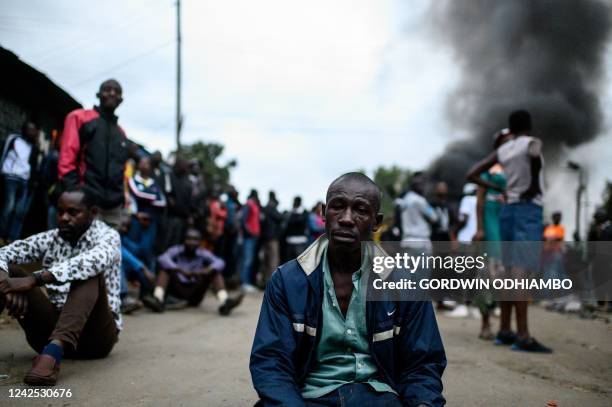 Supporters of Kenya's Azimio La Umoja Party presidential candidate Raila Odinga react during a protest against the results of Kenya's general...