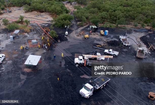 Aerial view showing the site where rescue personnel are try to reach 10 miners that have been trapped in a flooded coal mine since August 3, in the...