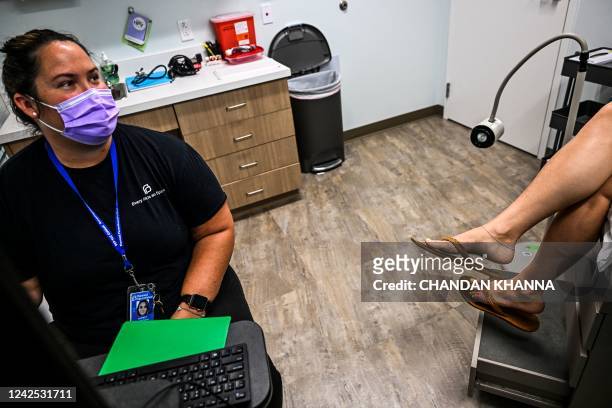 Woman, who chose to remain anonymous, talks to Doctor Audrey before recieving an abortion at a Planned Parenthood Abortion Clinic in West Palm Beach,...
